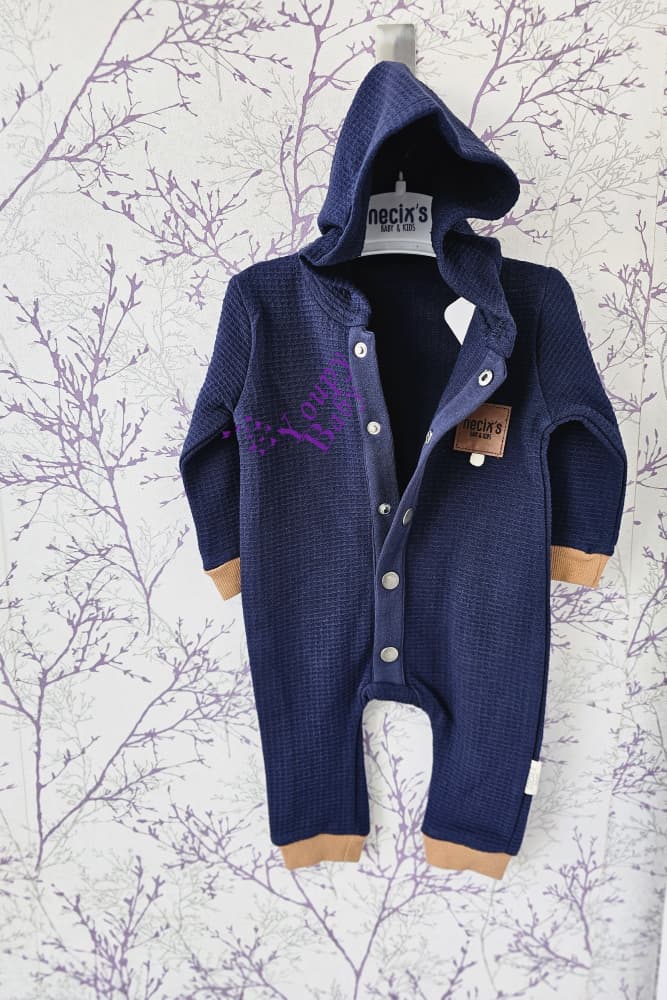 Combinaison à capuche